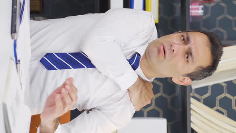 Vertical-video-of-Tired-businessman-with-aching-shoulders.
